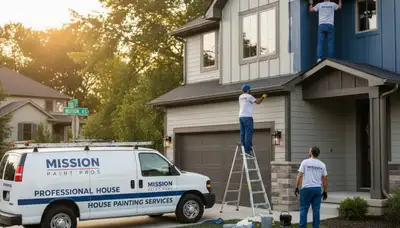 Professional house painters working on residential exterior in Olathe KS